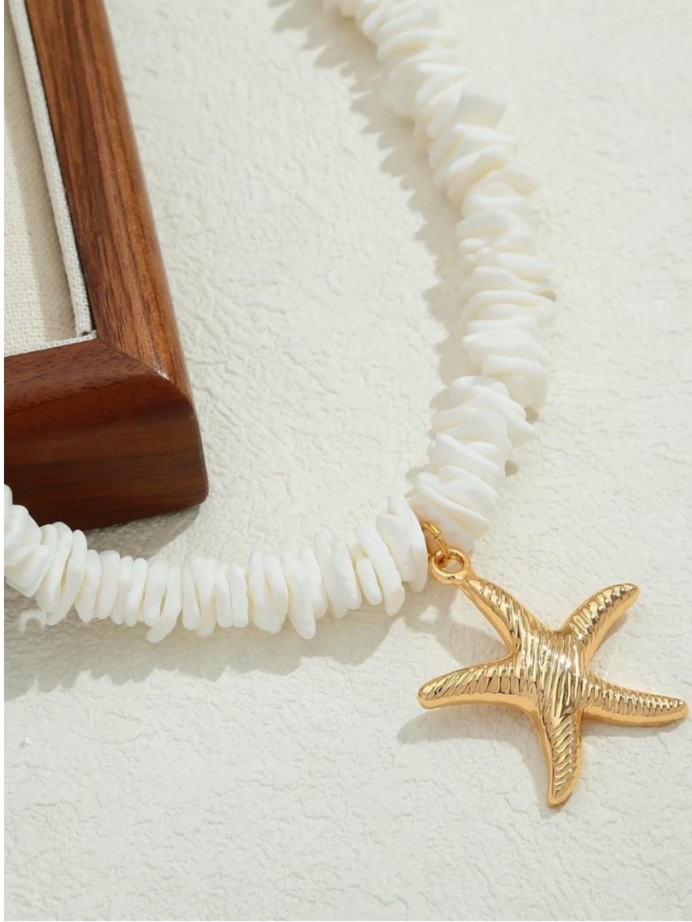 Anthropologie White Shell Chip Necklace with Gold Starfish Charm